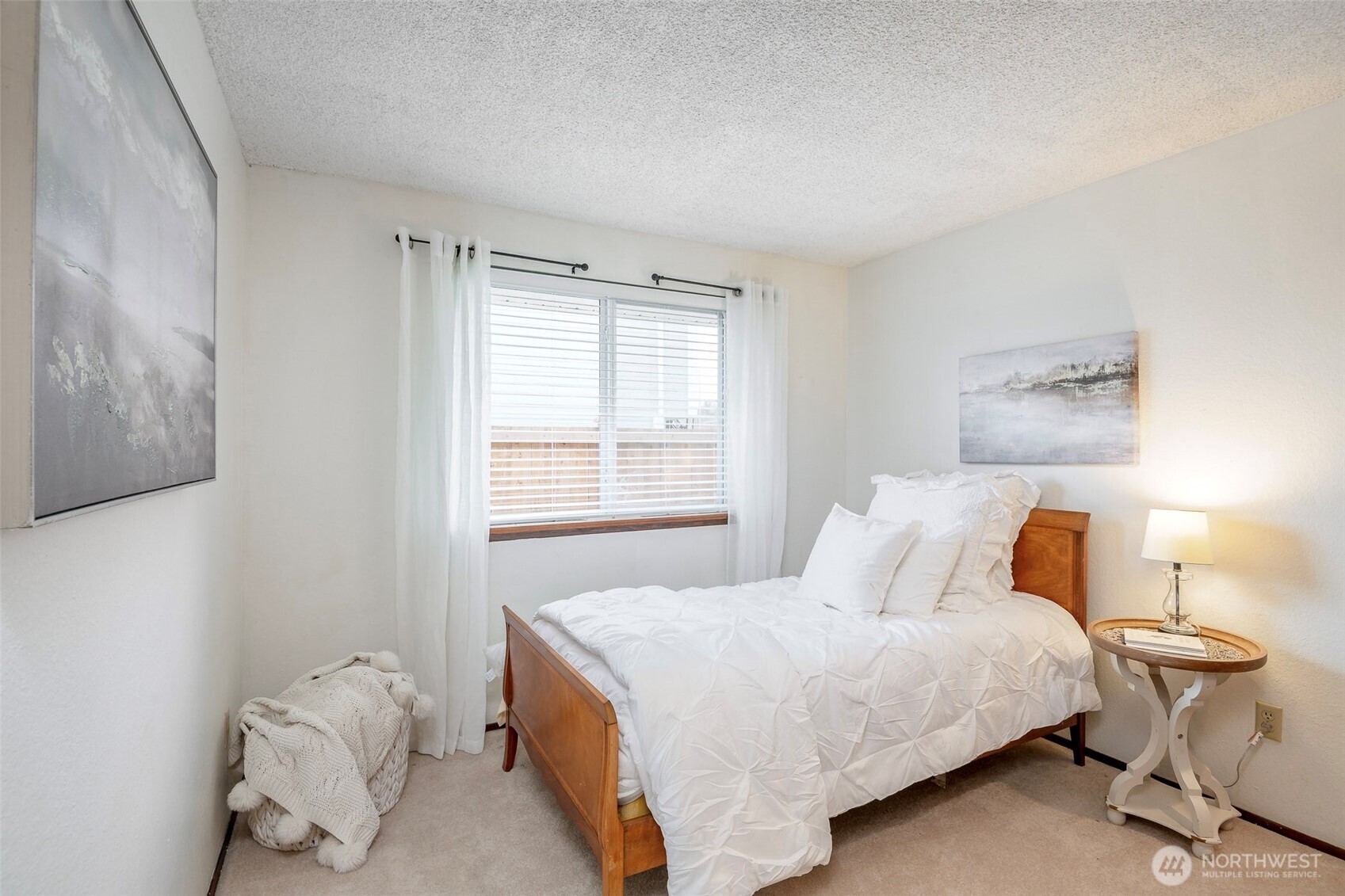 61 Bonney Street Steilacoom, WA 98388 - Photo 24 of 34 a bedroom with a bed and window