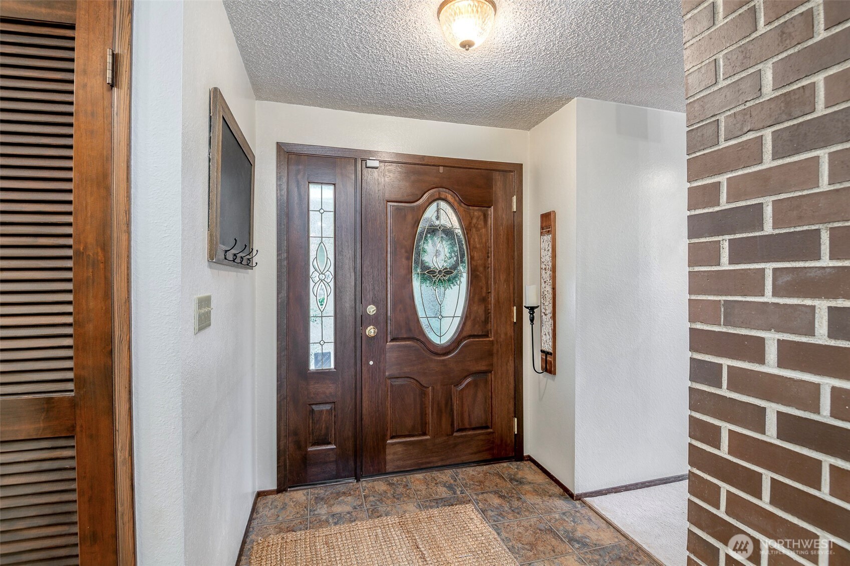 61 Bonney Street Steilacoom, WA 98388 - Photo 26 of 34 a view of a hallway with entryway