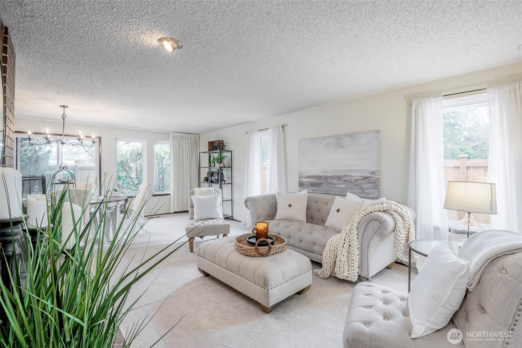 61 Bonney Street Steilacoom, WA 98388 - Photo 4 of 34 a living room with furniture and a large window