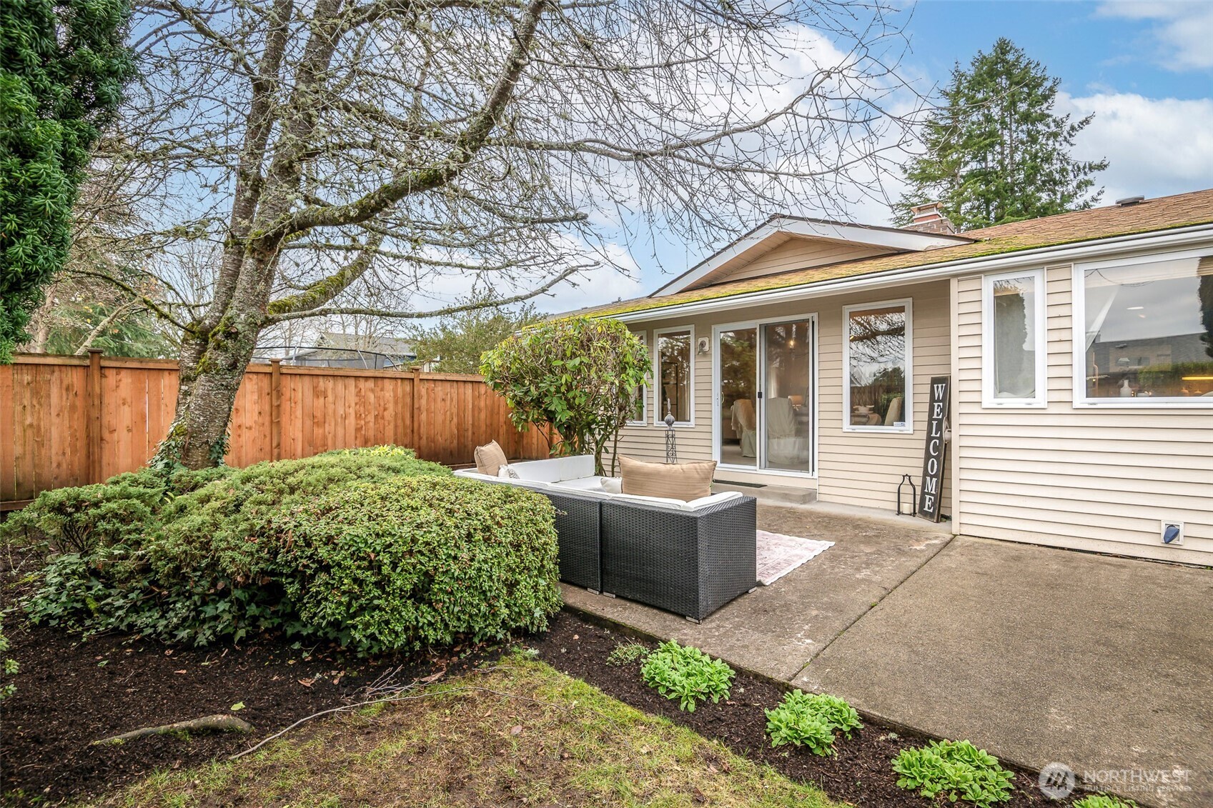 61 Bonney Street Steilacoom, WA 98388 - Photo 7 of 34 a view of house with backyard and sitting area