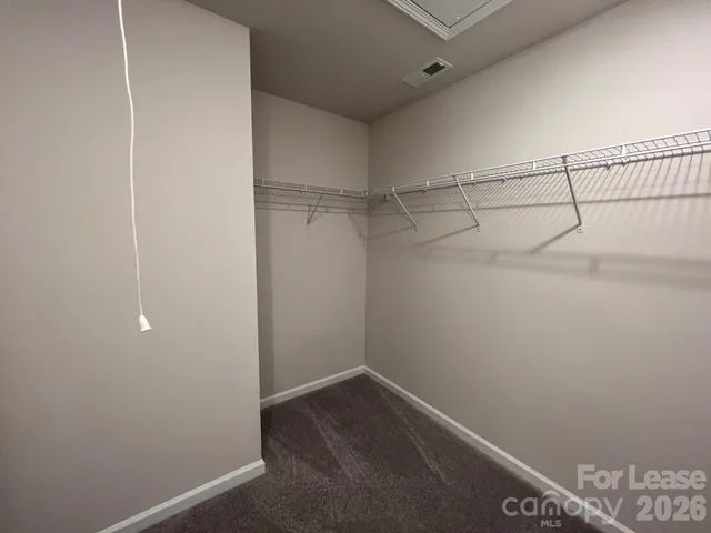 a view of a room with racks on the wall