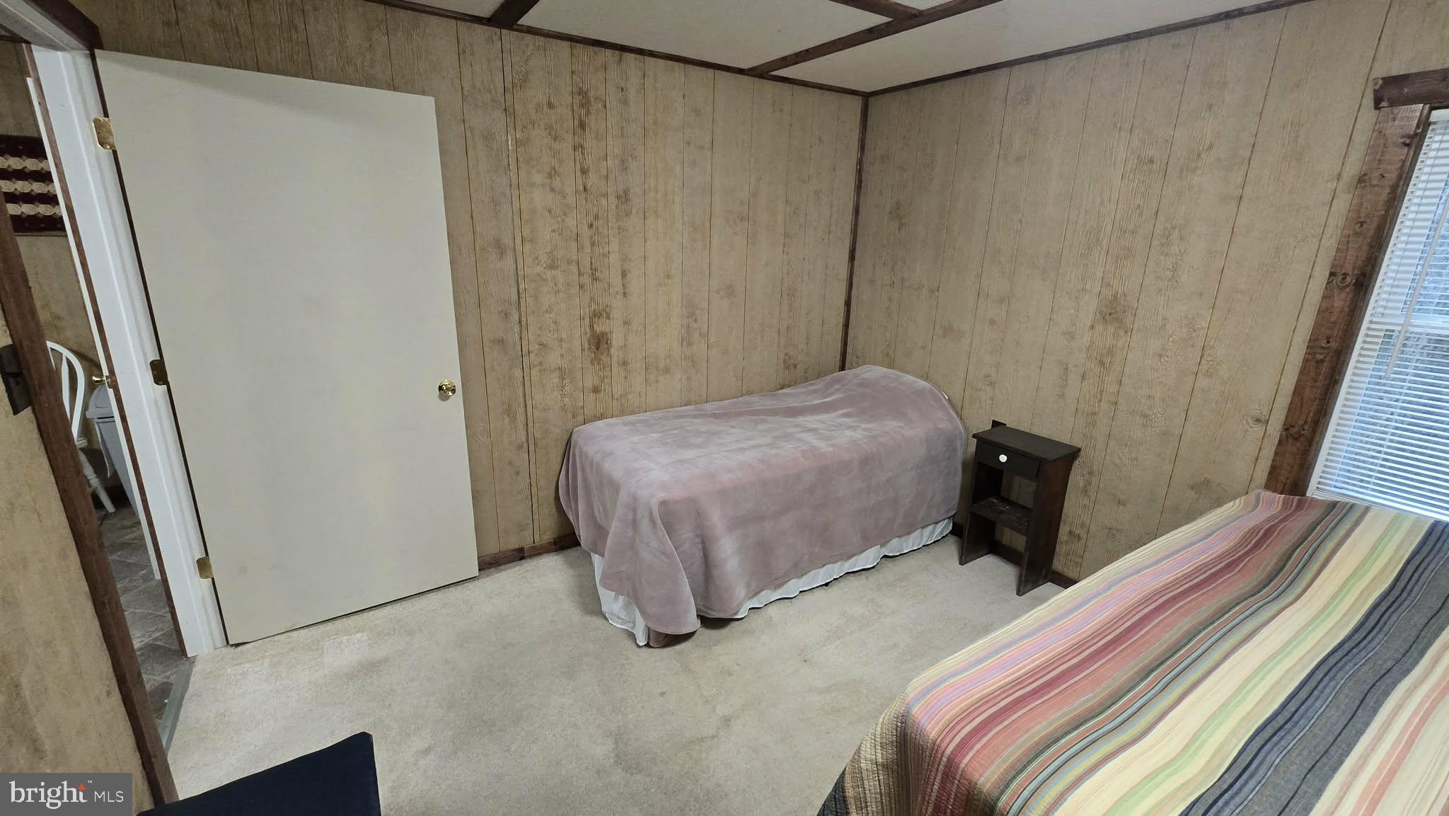 8245 Aughwick Road Fort Loudon, PA 17224 - Photo 19 of 26 a bedroom with a bed and a window