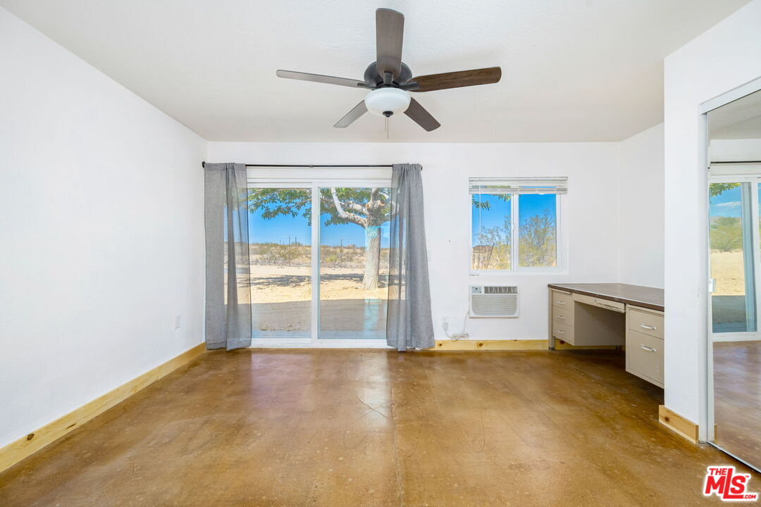 57157 Emerald Way Landers, CA 92285 - Photo 8 of 12 a view of an empty room with a window