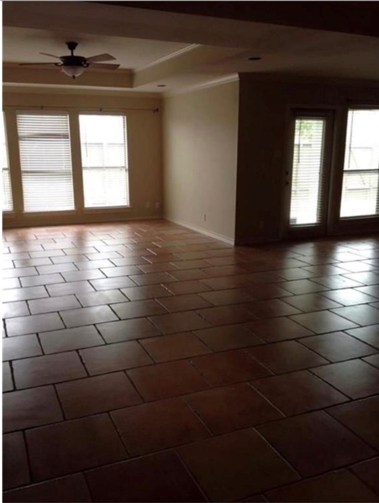 4245 Santa Fe Street Corpus Christi, TX 78411 - Photo 3 of 4 a view of empty room with window and outdoor view