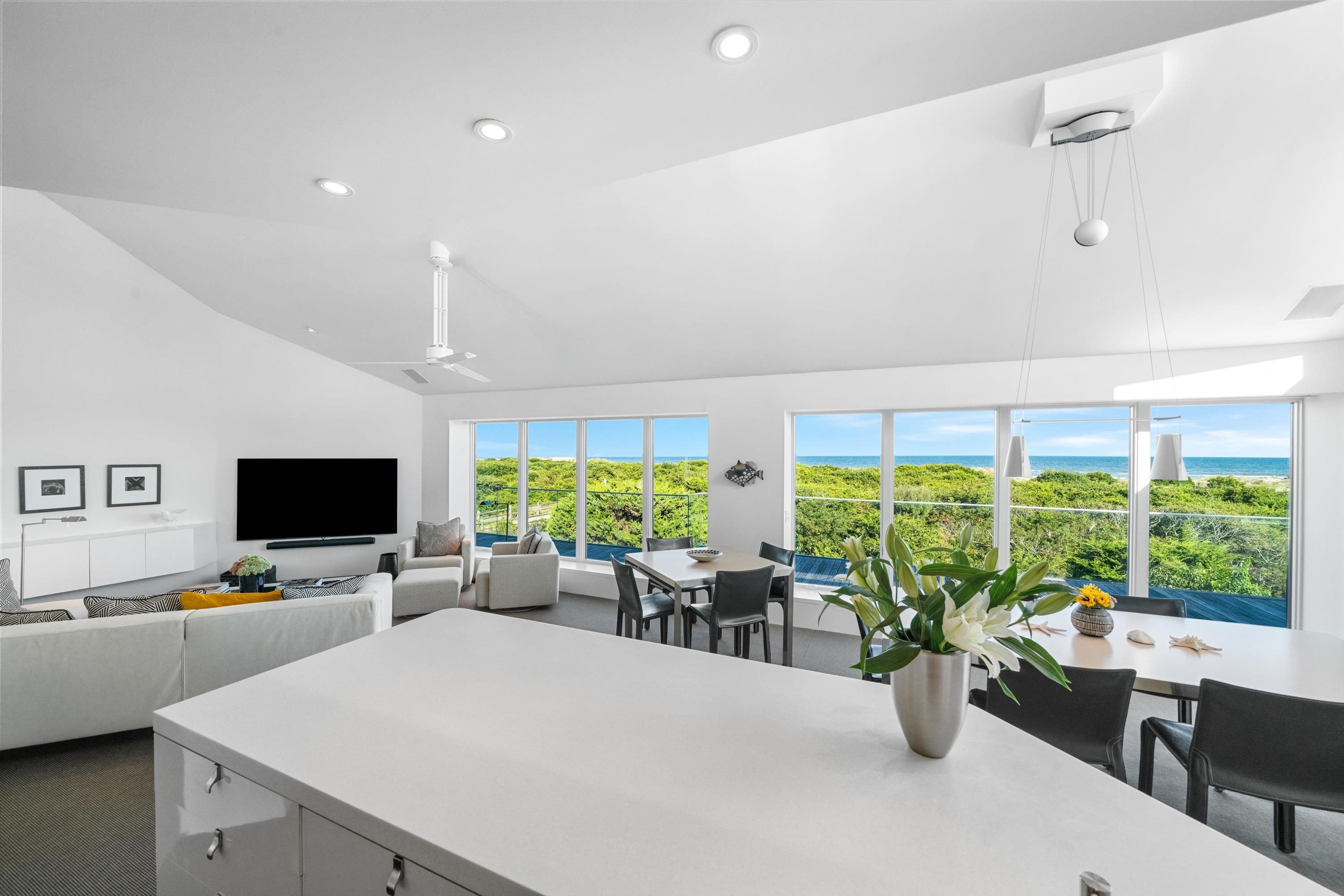 103 116th Street Stone Harbor, NJ 08247 - Photo 11 of 49 a view of a dining room with furniture window and outside view