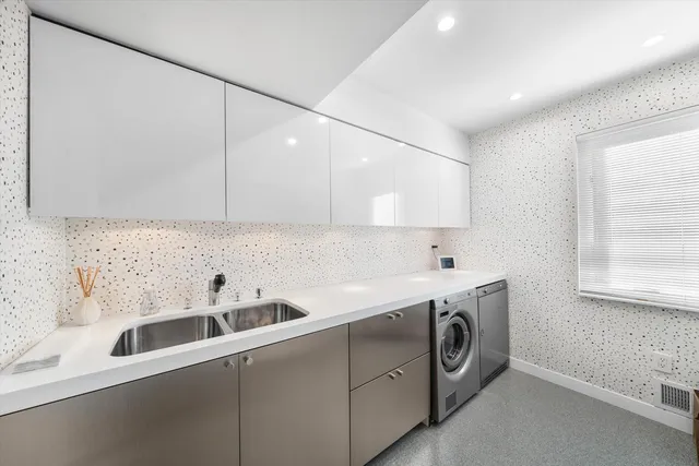 a bedroom with furniture and a flat screen tv