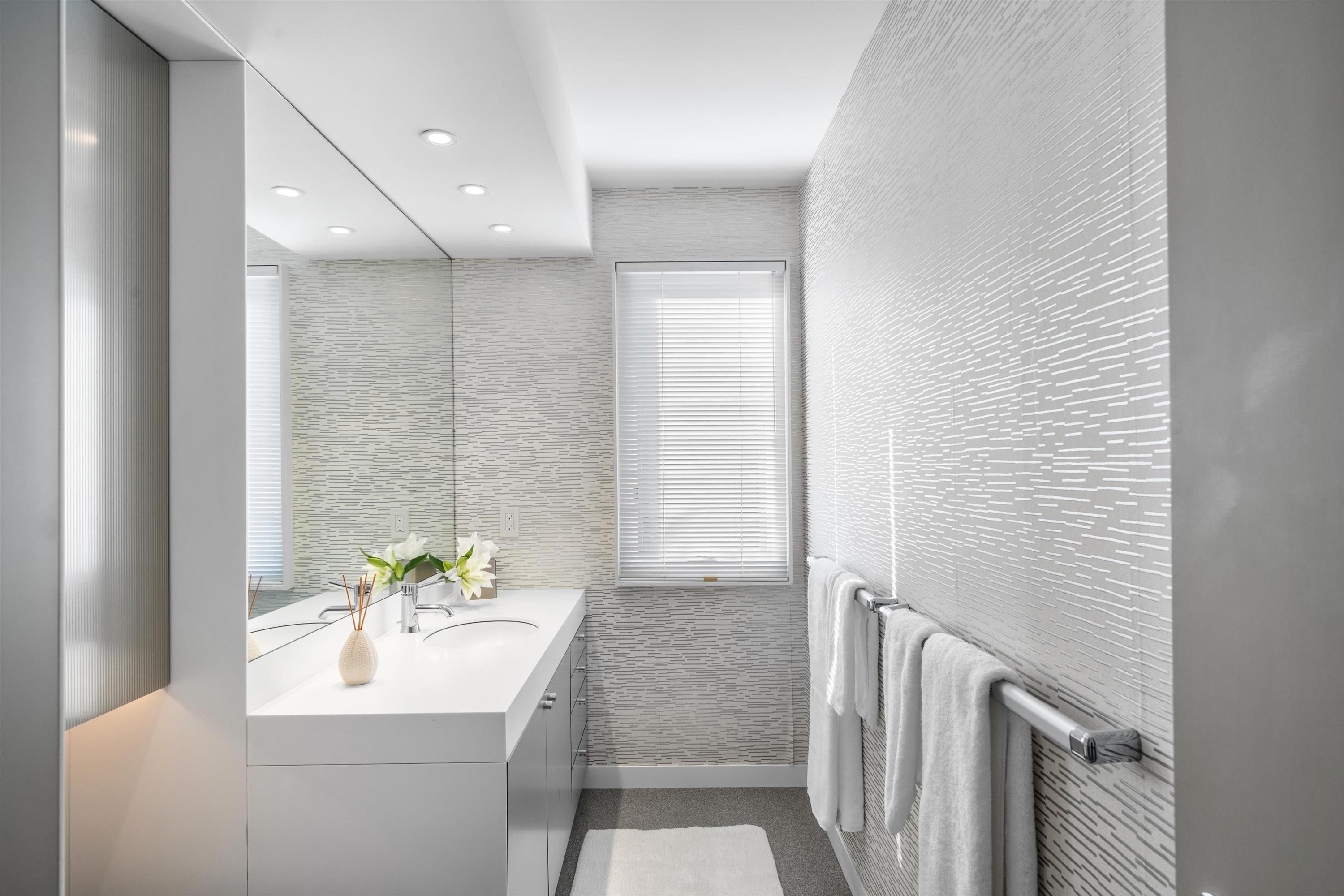 103 116th Street Stone Harbor, NJ 08247 - Photo 21 of 49 a bathroom with a sink a toilet and tub