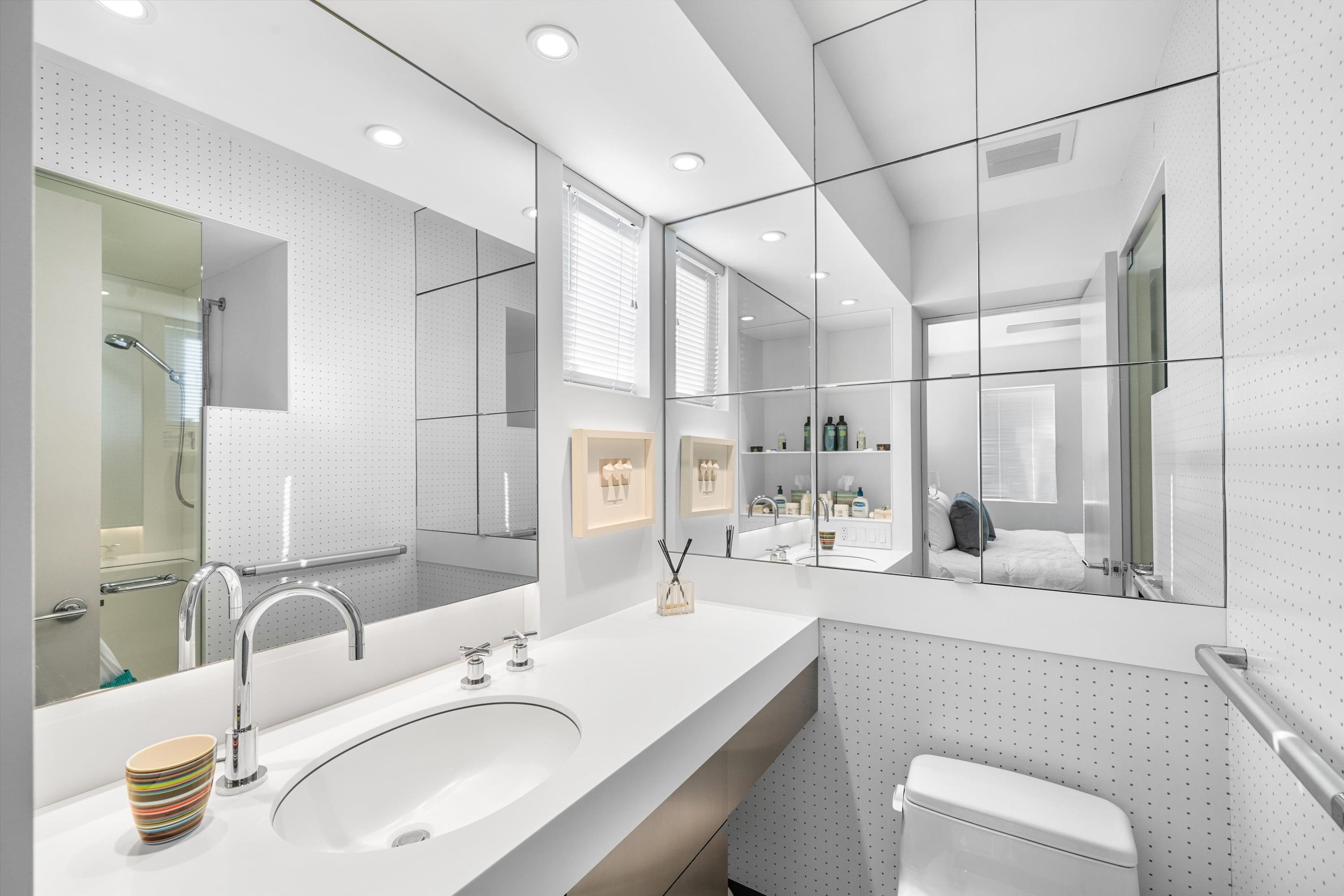 103 116th Street Stone Harbor, NJ 08247 - Photo 23 of 49 a bathroom with a sink double vanity and a tub