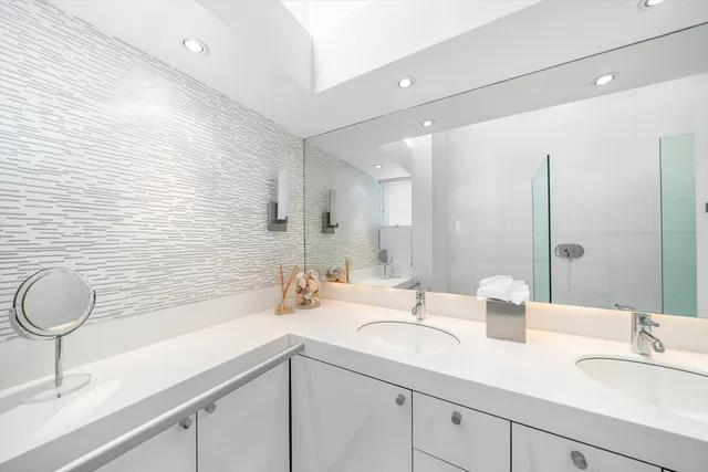 a bedroom with bed and window