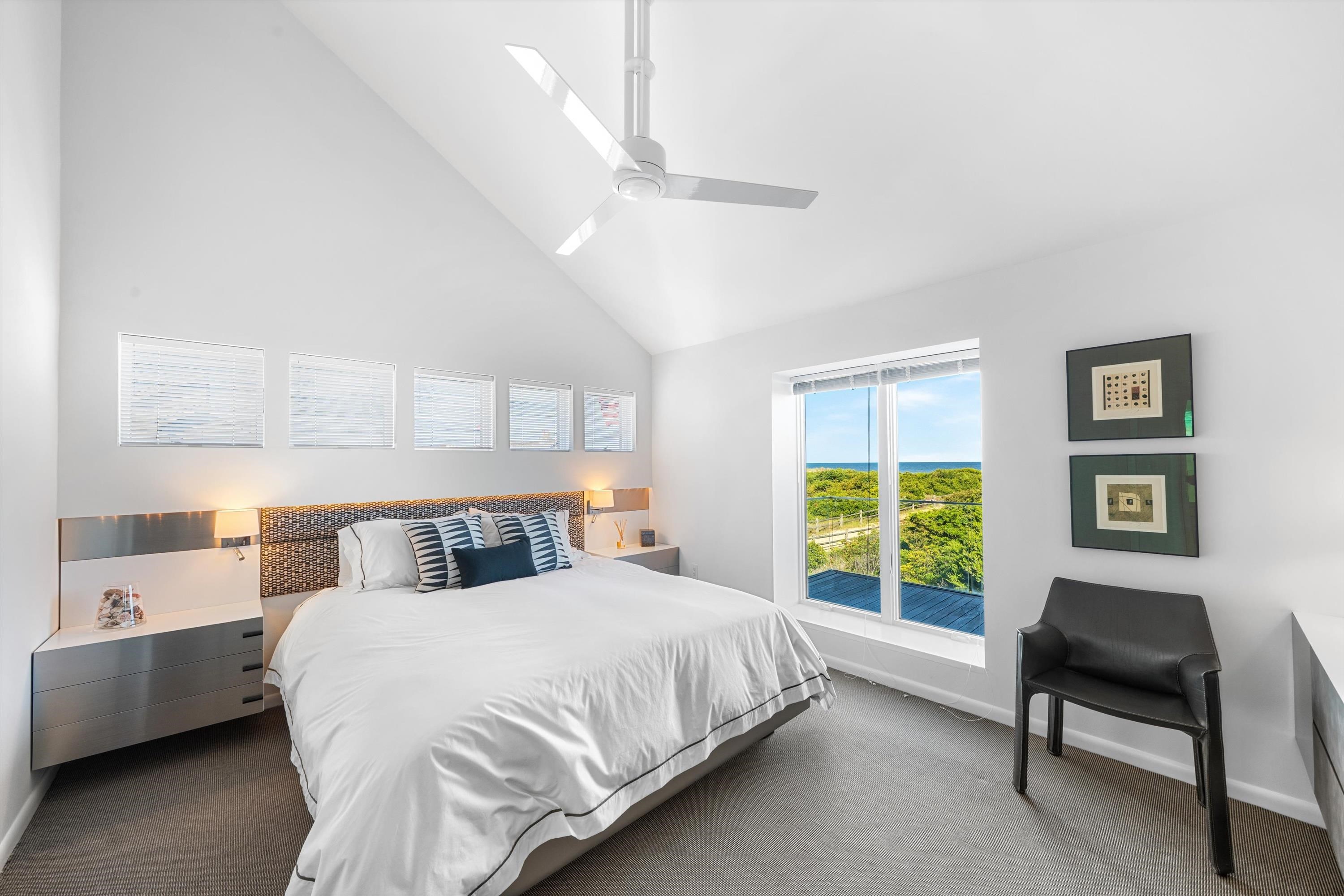 103 116th Street Stone Harbor, NJ 08247 - Photo 29 of 49 a bed room with a bed and a chair