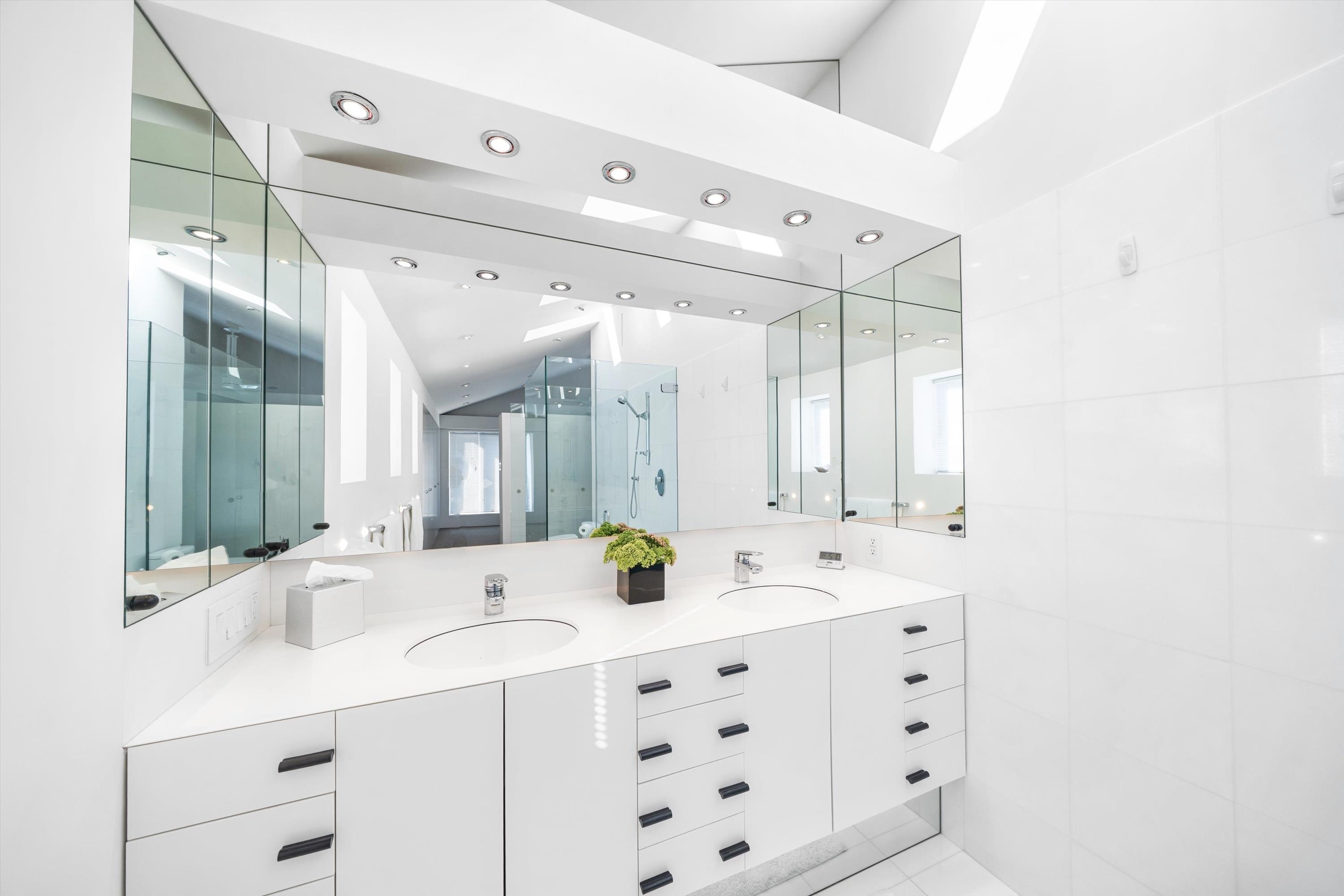 103 116th Street Stone Harbor, NJ 08247 - Photo 31 of 49 a bathroom with a double vanity sink mirror and double