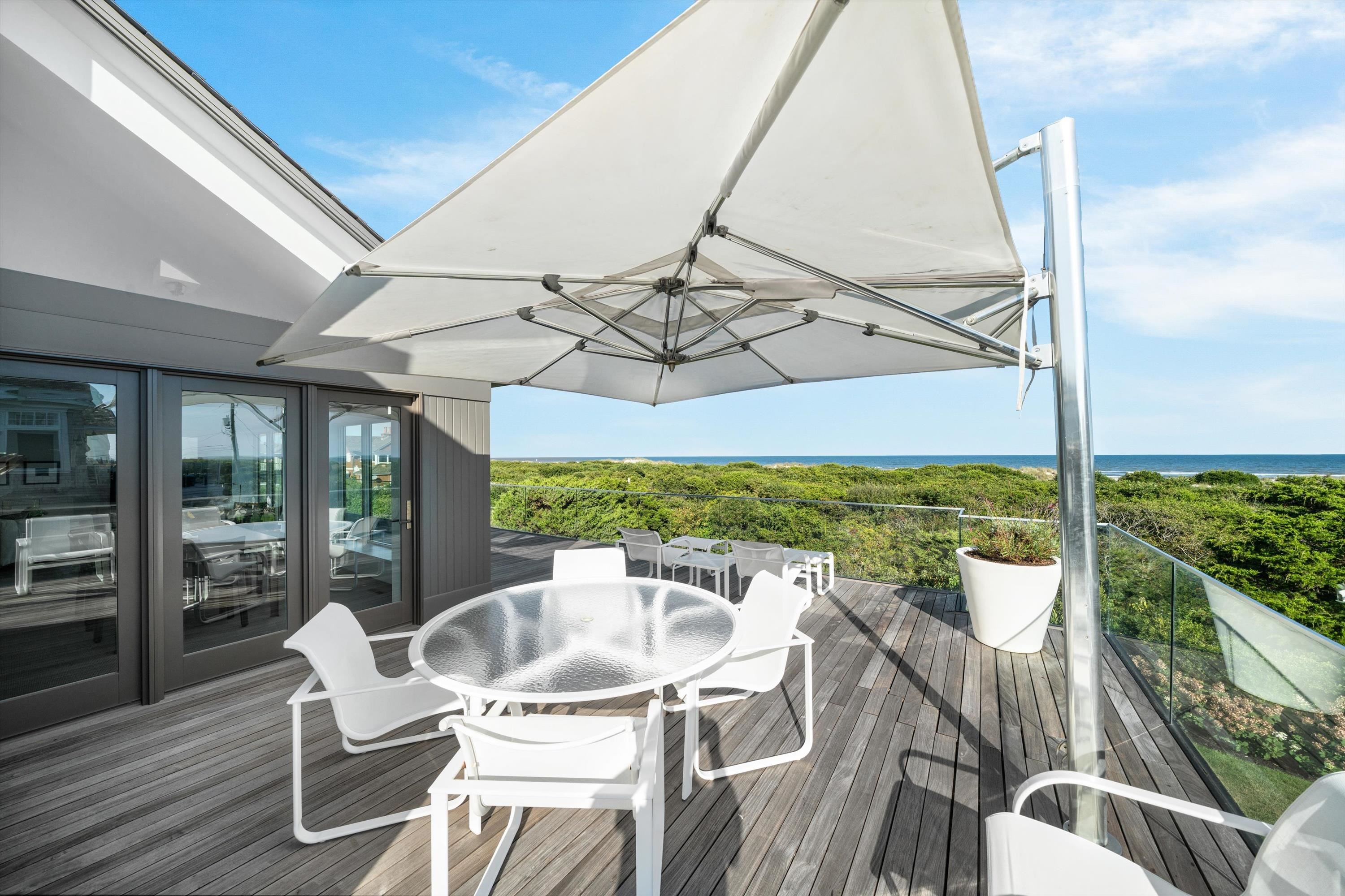 103 116th Street Stone Harbor, NJ 08247 - Photo 36 of 49 a view of a dining room with furniture window and outside view