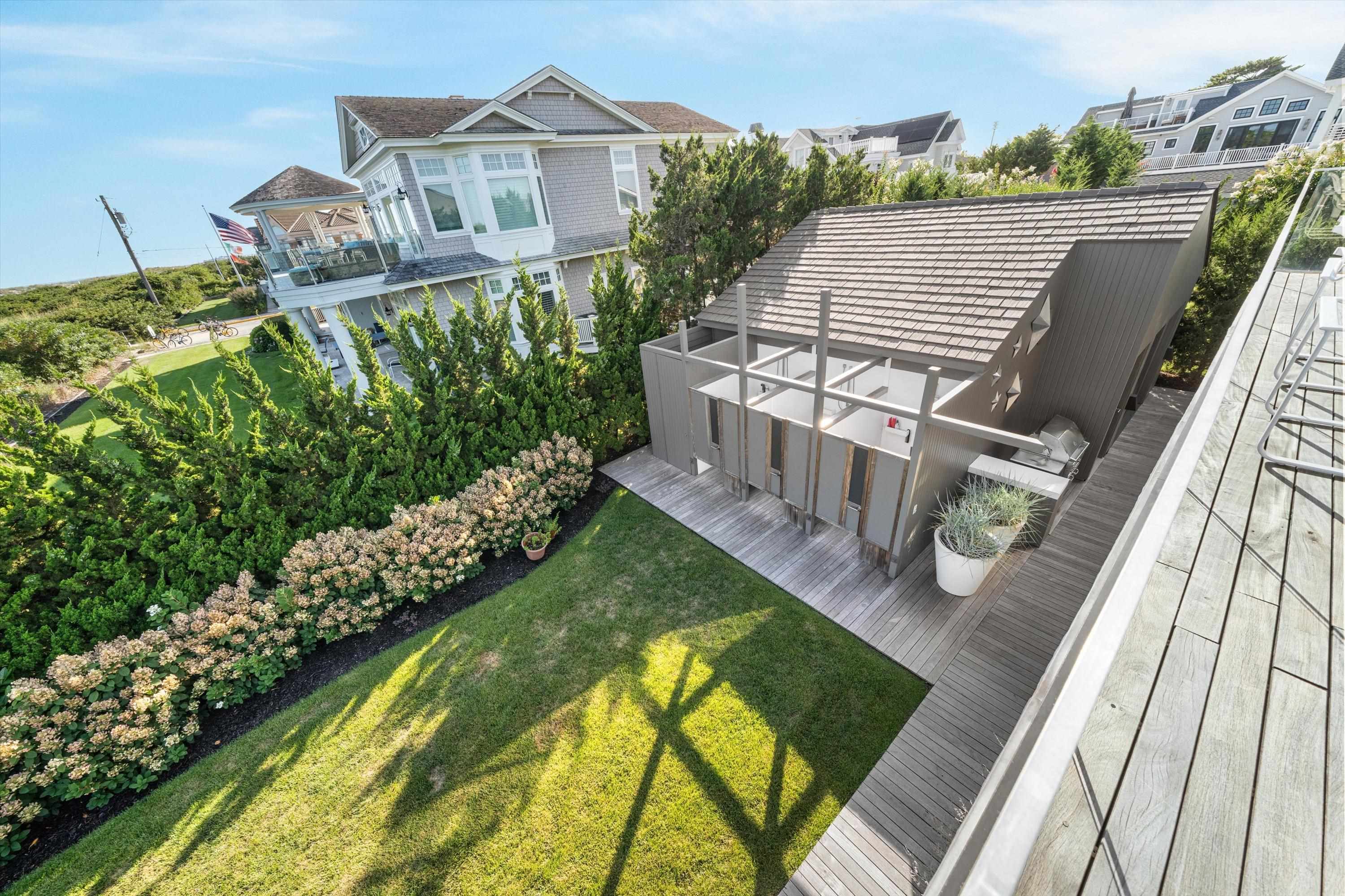 103 116th Street Stone Harbor, NJ 08247 - Photo 37 of 49 a view of a house with backyard and garden