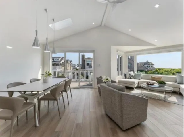 a kitchen with stainless steel appliances a sink stove and refrigerator