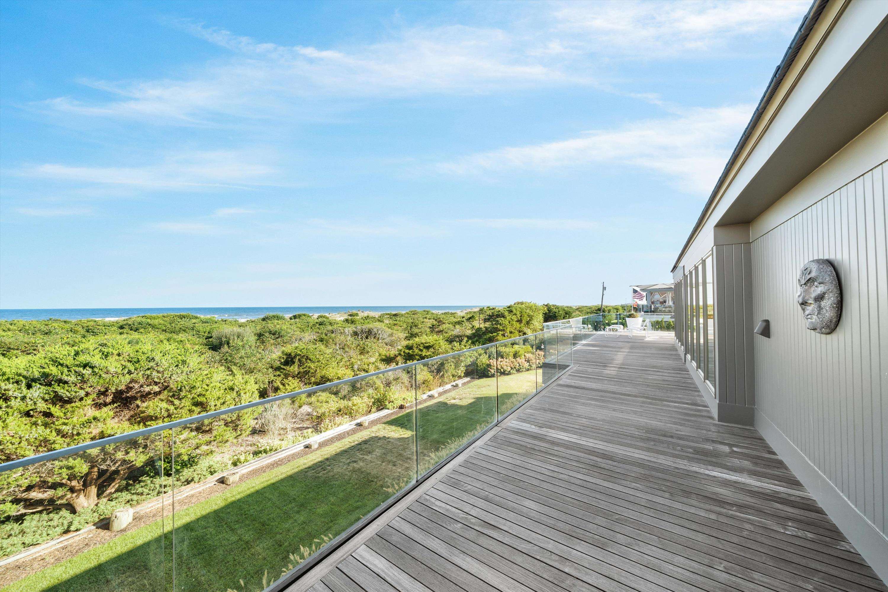 103 116th Street Stone Harbor, NJ 08247 - Photo 7 of 49 a view of balcony with wooden floor
