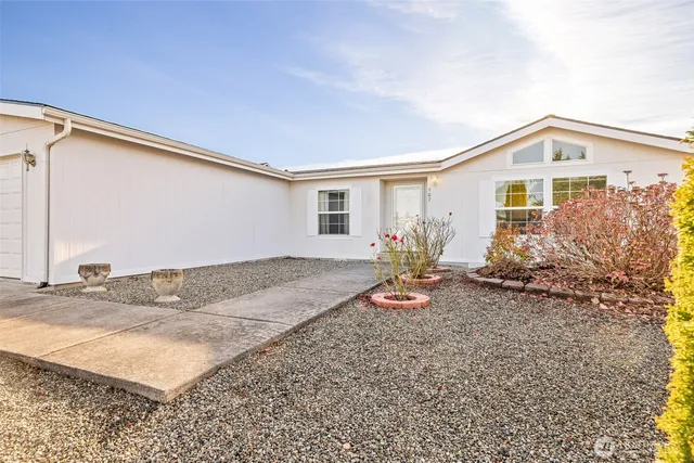 a view of a house with a street