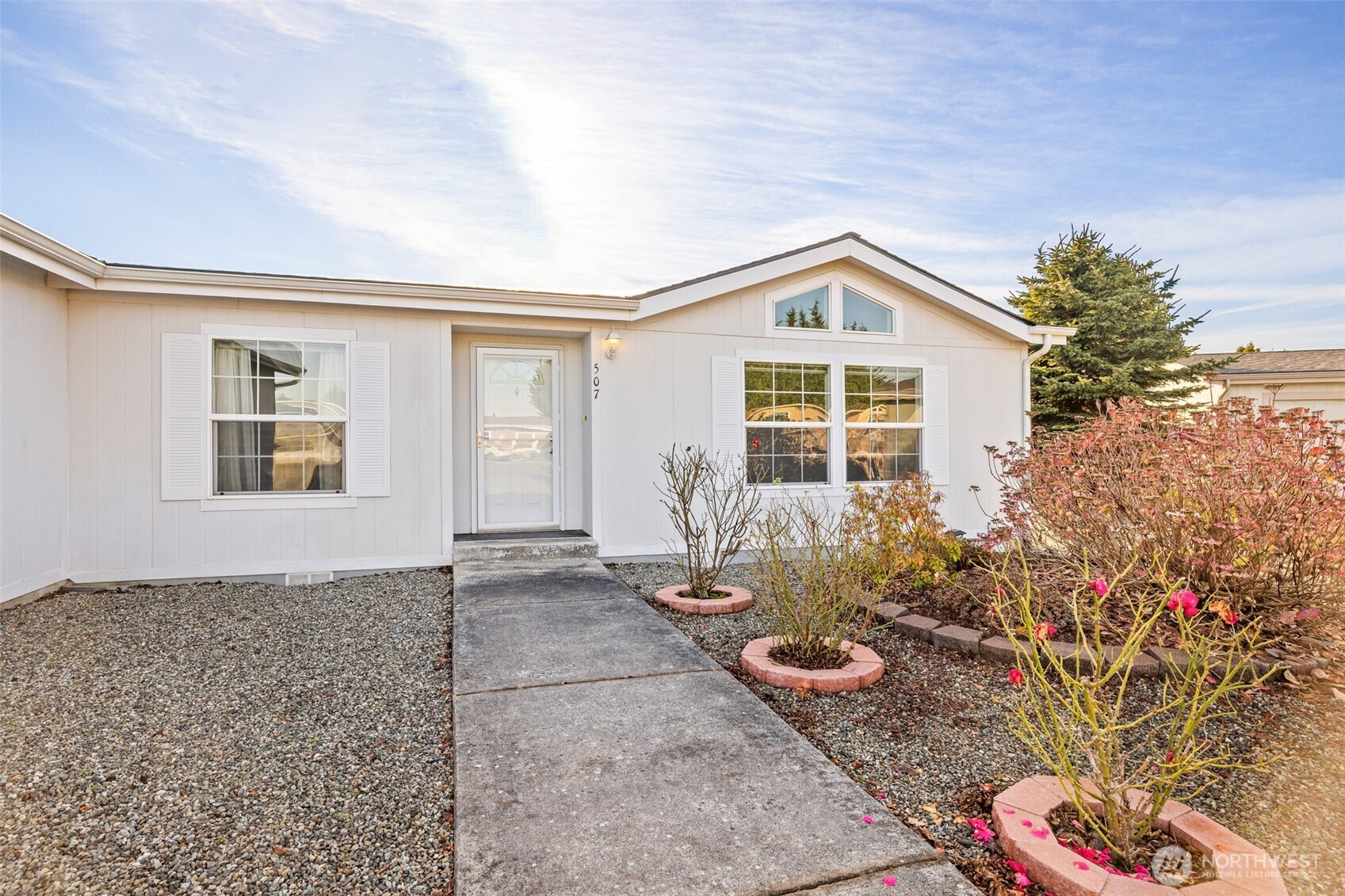 507 North 7th Avenue Sequim, WA 98382 - Photo 31 of 40 a view of an house with backyard space and garden