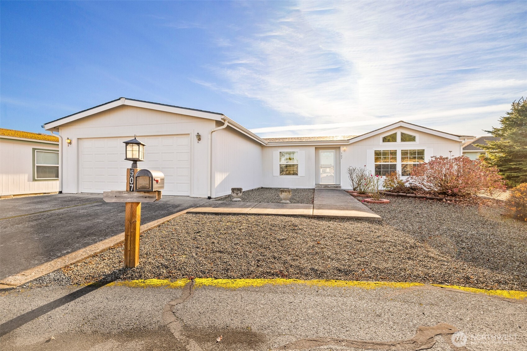 507 North 7th Avenue Sequim, WA 98382 - Photo 34 of 40 a front view of a house with garden