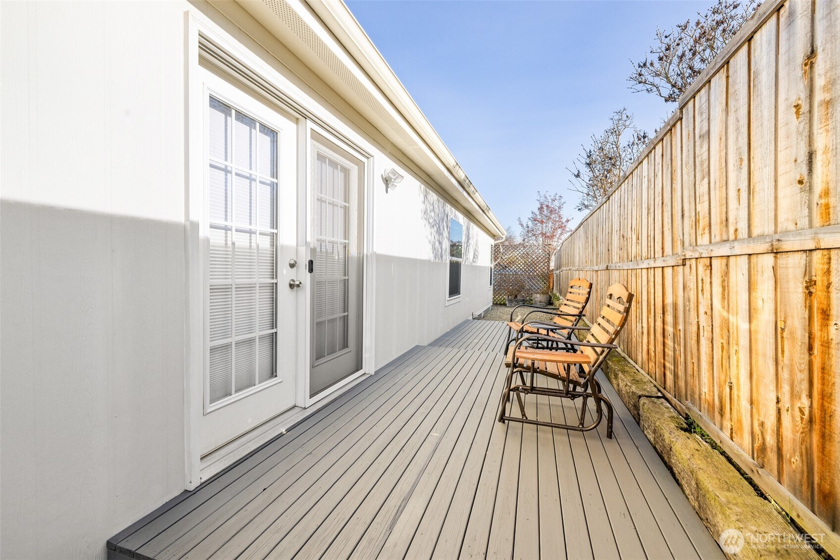 507 North 7th Avenue Sequim, WA 98382 - Photo 36 of 40 a balcony with wooden floor and outdoor space