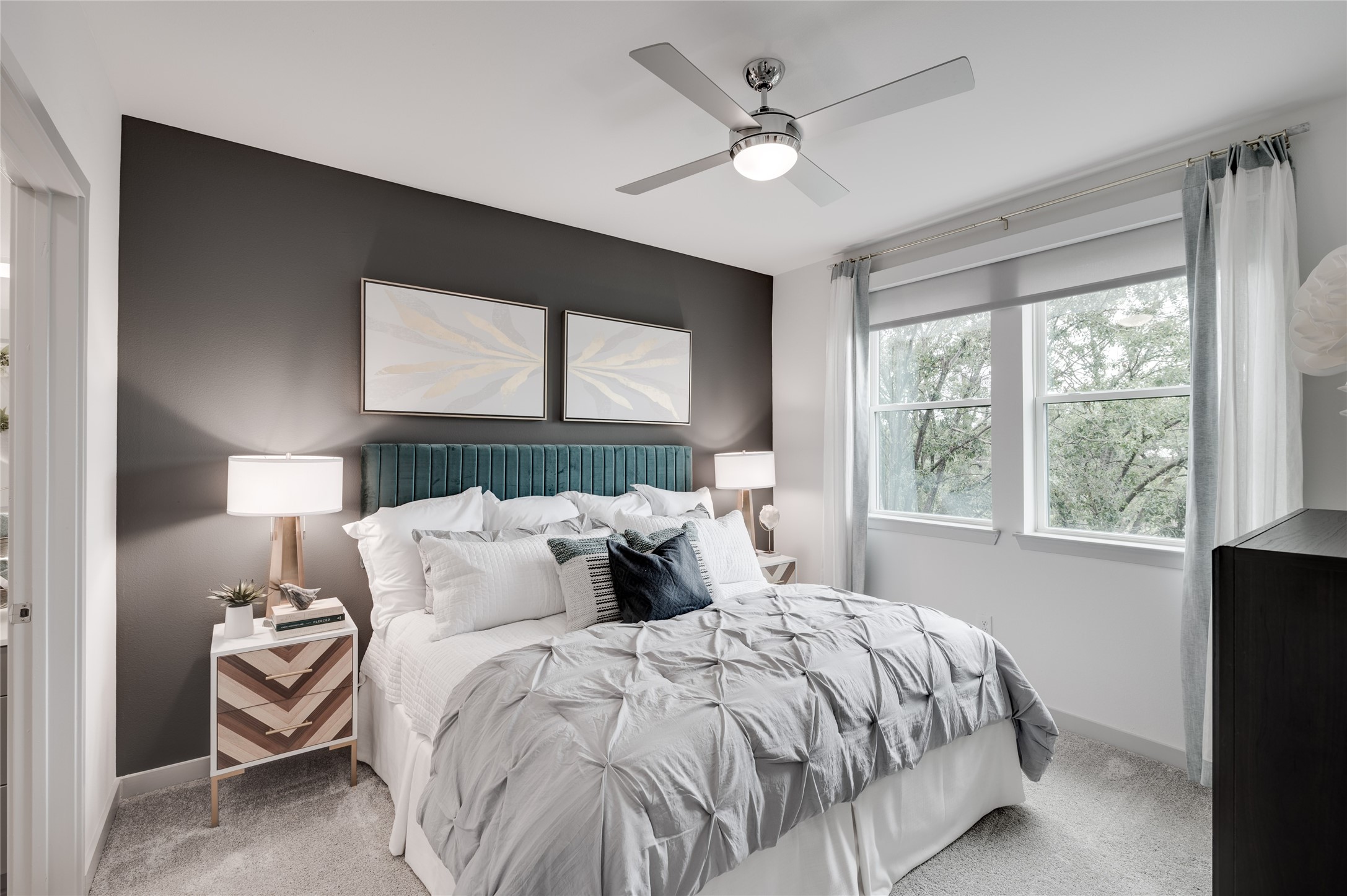 3636 West Dallas Street, Unit 356 Houston, TX 77019 - Photo 4 of 10 The serene primary suite offers generous proportions, abundant natural light, and a relaxing retreat from the energy of the city.