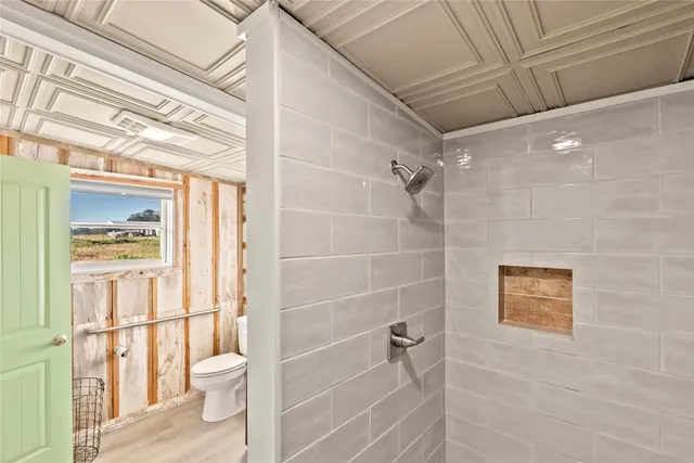 a view of a porch with furniture and a table