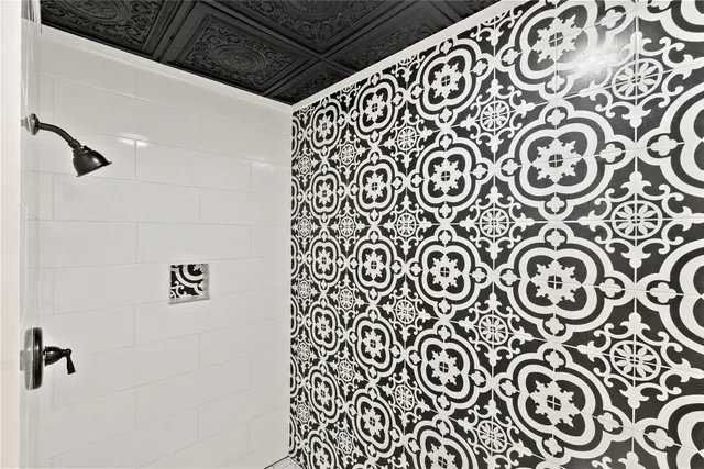 a porch with a table and chairs in patio