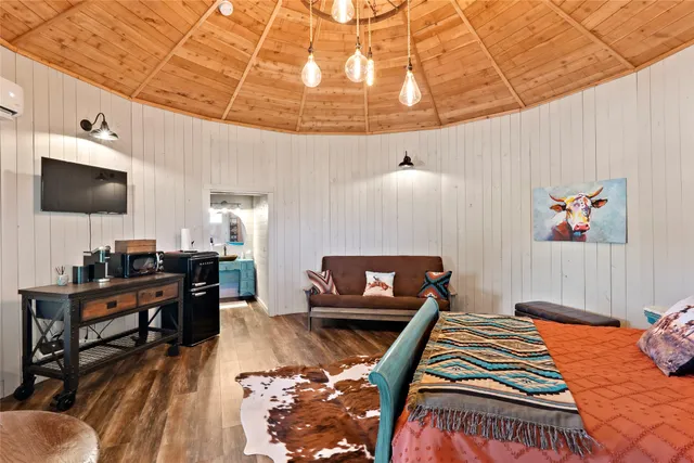 a living room with furniture and a table