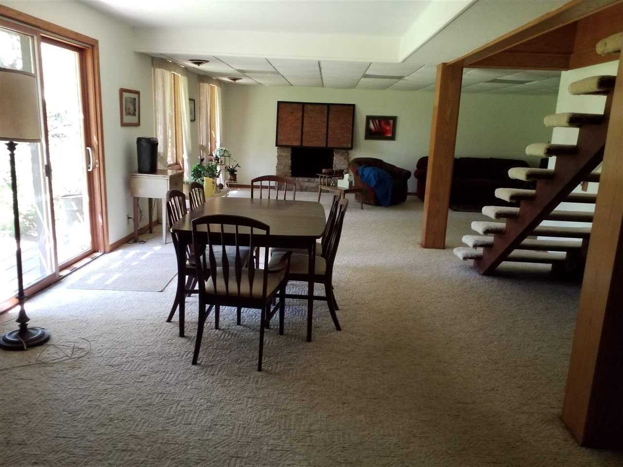 1548 Riverside Road Belvidere, IL 61008 - Photo 16 of 21 a view of a dining room with furniture and a window