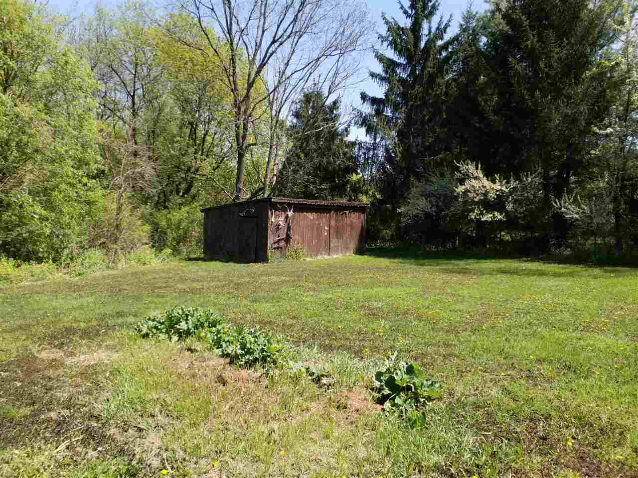 1548 Riverside Road Belvidere, IL 61008 - Photo 21 of 21 a view of a backyard