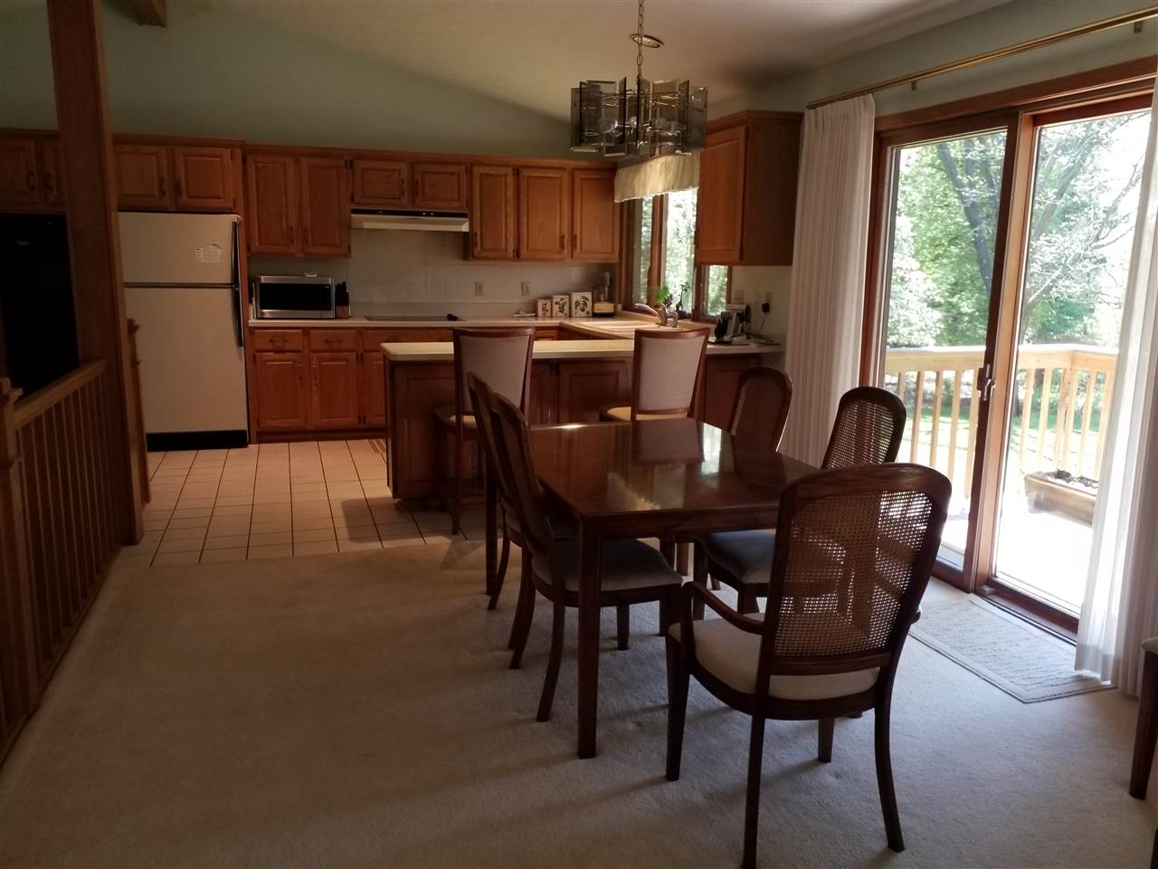 1548 Riverside Road Belvidere, IL 61008 - Photo 4 of 21 a view of a dining room with furniture window and outside view