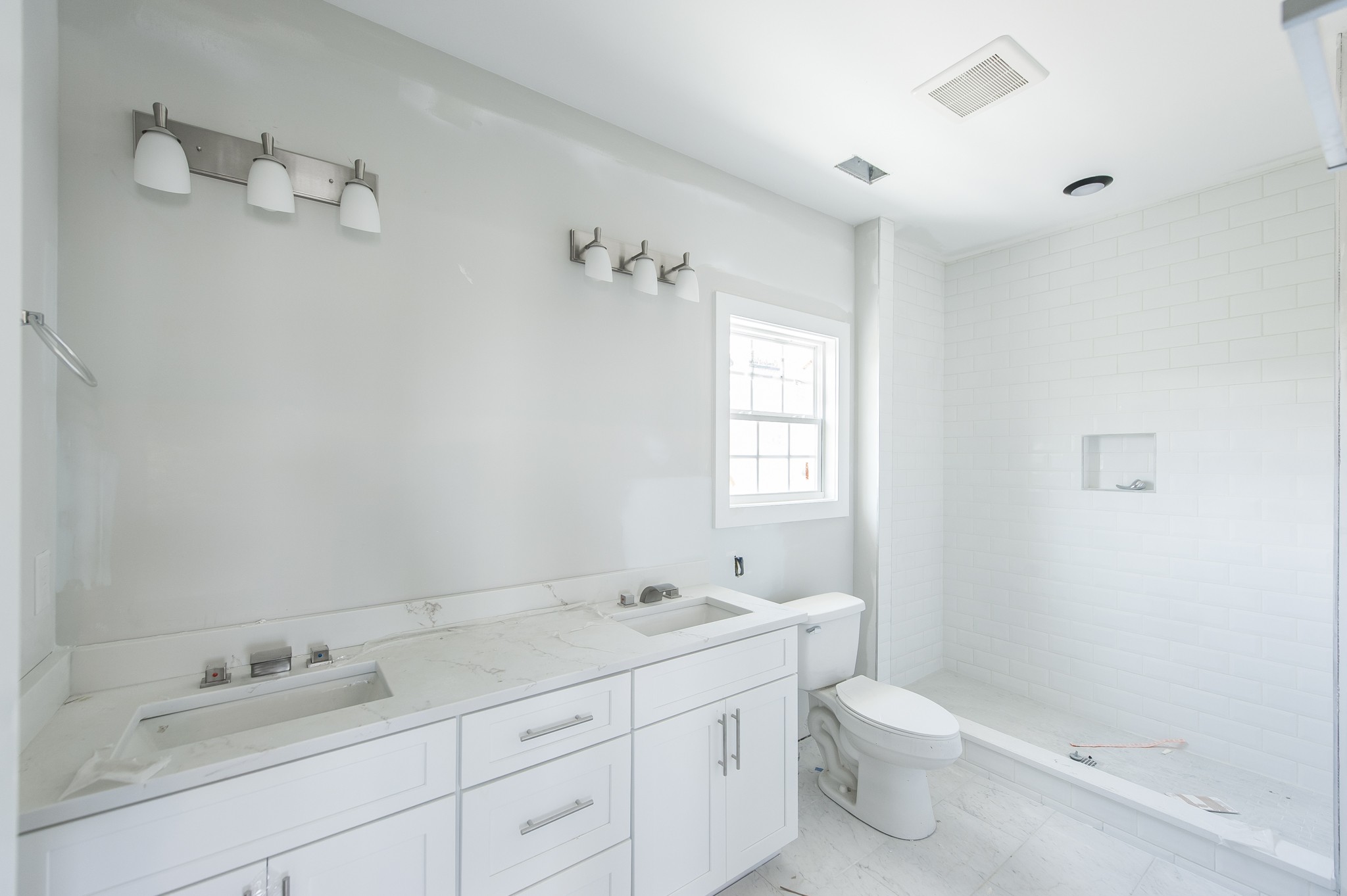 421 Elysian Fields Road, Unit 2 Nashville, TN 37211 - Photo 11 of 22 a bathroom with a granite countertop sink mirror and toilet