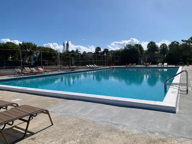 a view of a lake with a yard