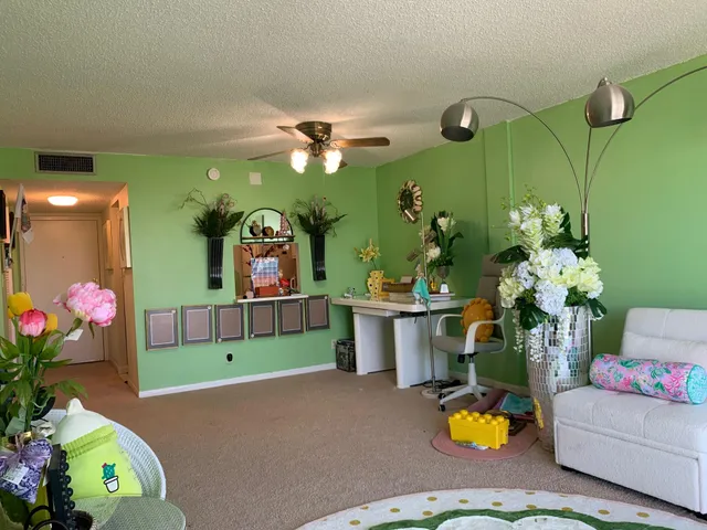 a bathroom with a sink mirror and vanity