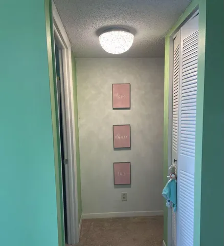 a bathroom with a shower and a mirror