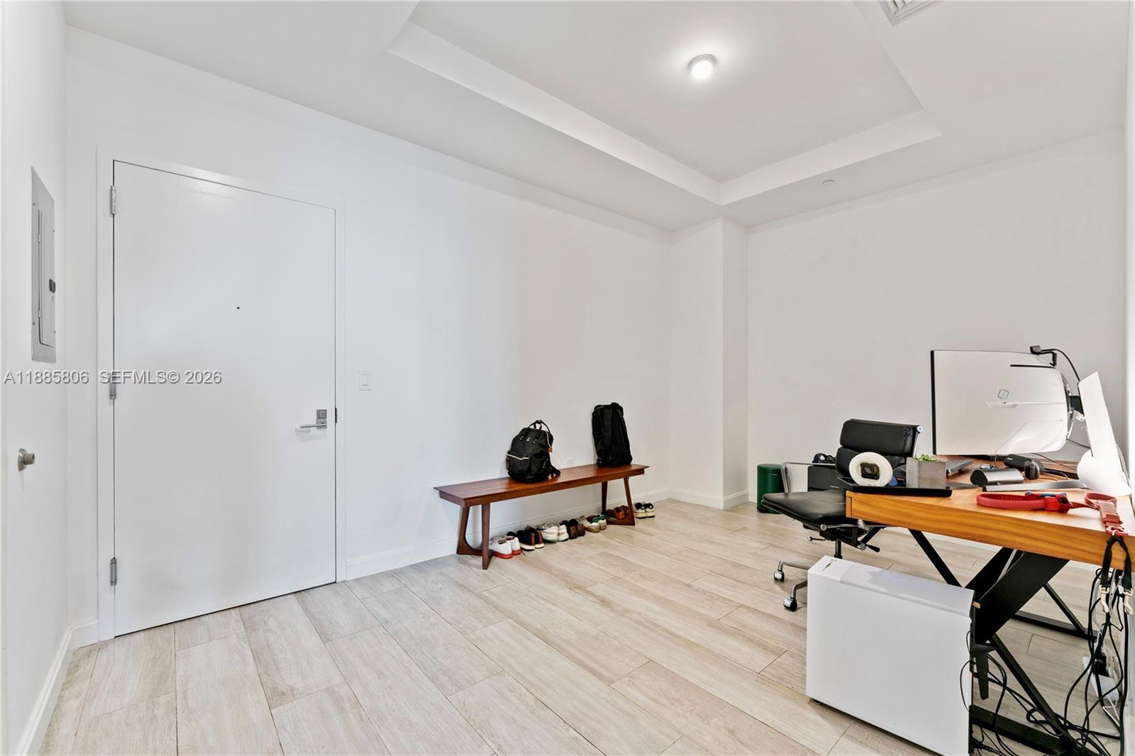 45 Southwest 9th Street, Unit 4205 Miami, FL 33130 - Photo 23 of 32 a room with gym equipment and wooden floor