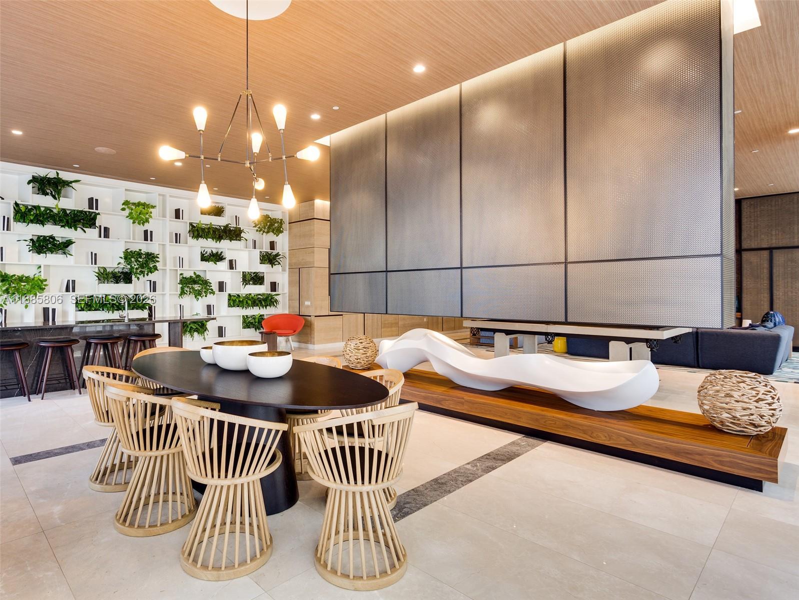 45 Southwest 9th Street, Unit 4205 Miami, FL 33130 - Photo 30 of 32 a dining room with furniture