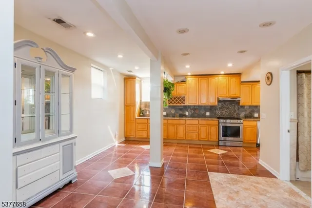 a bathroom with a tub and a shower