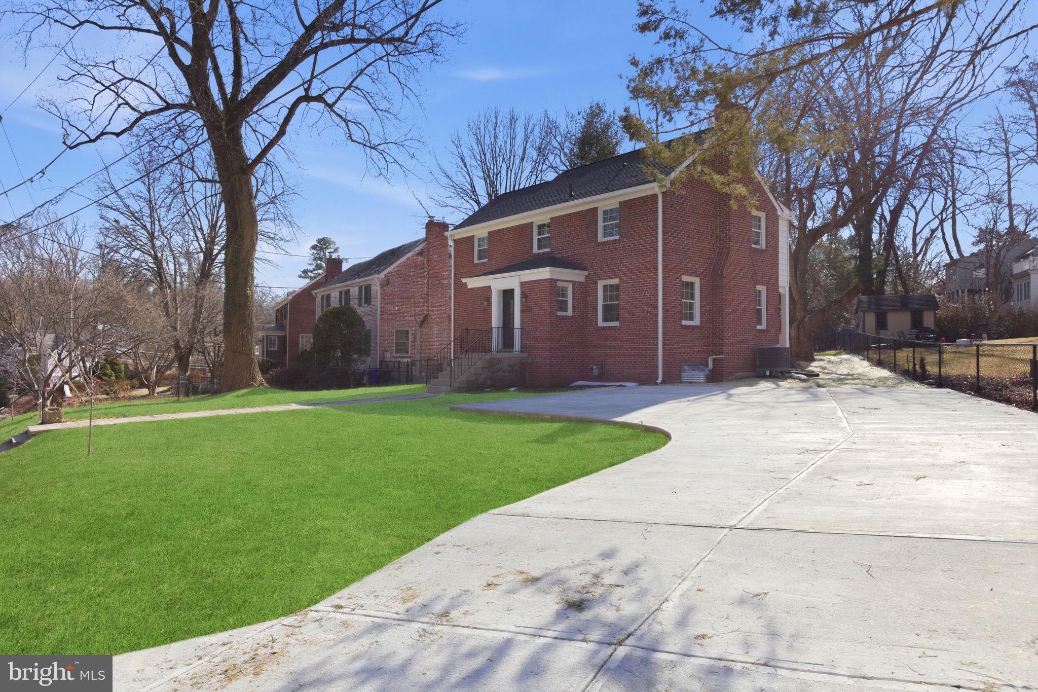 311 Ellsworth Drive Silver Spring, MD 20910 - Photo 3 of 60 a view of a house with a yard