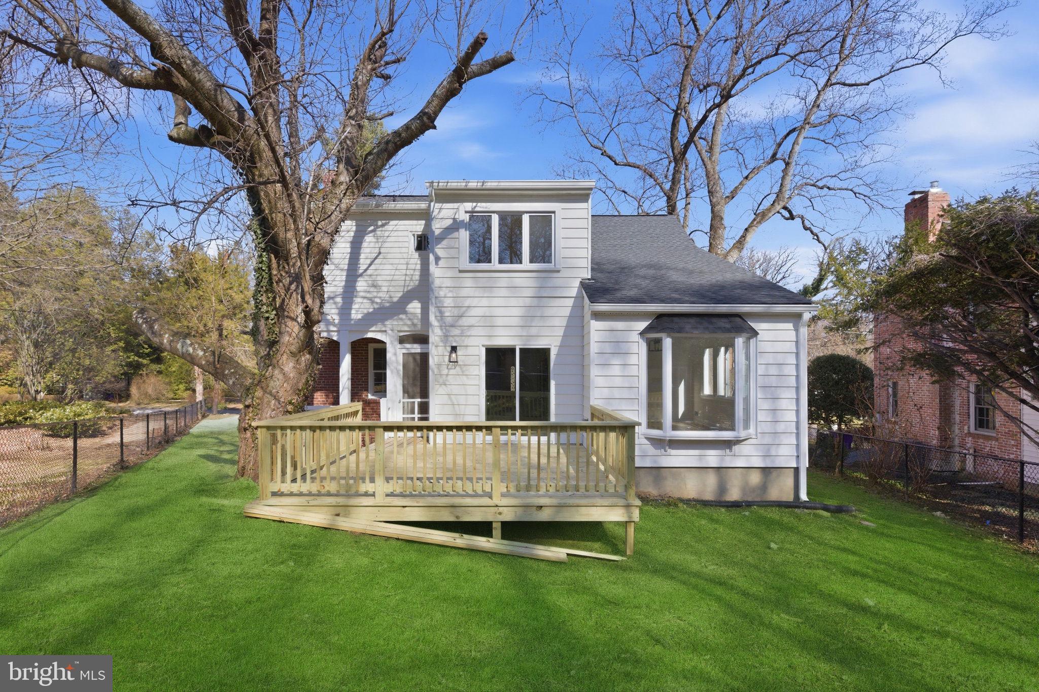 311 Ellsworth Drive Silver Spring, MD 20910 - Photo 58 of 60 a view of a house with a yard