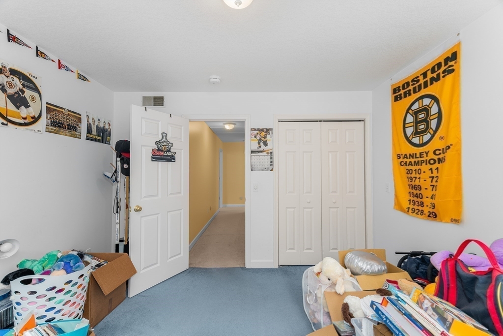 113 Greenwich Plains Road Ware, MA 01082 - Photo 25 of 42 a bedroom with a bed and a window