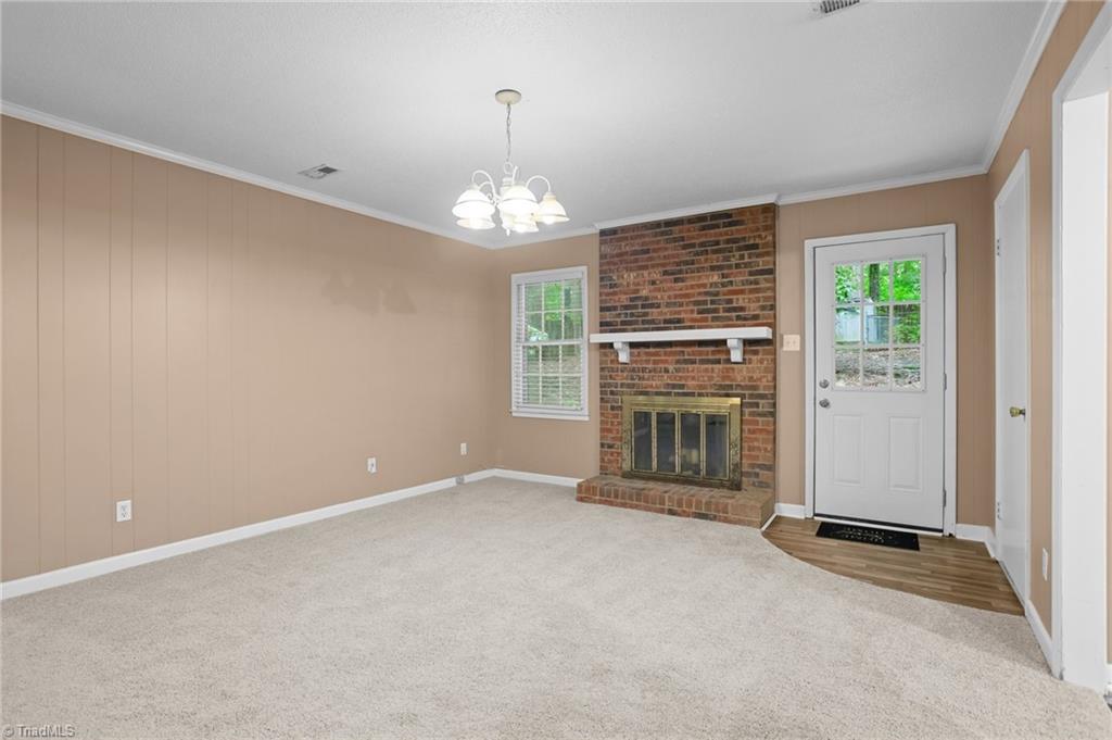 1405 Pepper Hill Road Greensboro, NC 27407 - Photo 25 of 50 Wood burning fireplace in Den