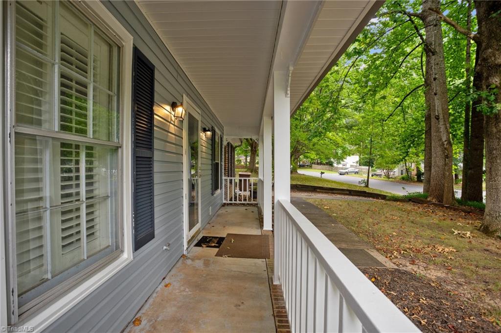 1405 Pepper Hill Road Greensboro, NC 27407 - Photo 4 of 50 Enjoy this rocking chair front porch!