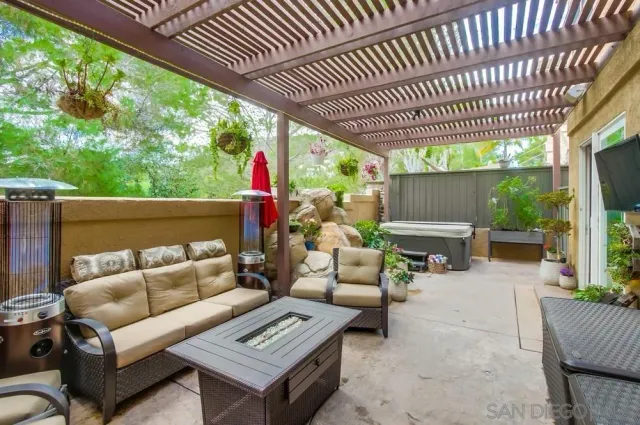 a outdoor living space with furniture and garden view