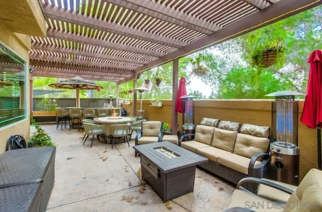 a outdoor living space with furniture and garden view