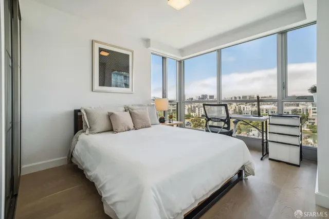 a view of a living room and a floor to ceiling window