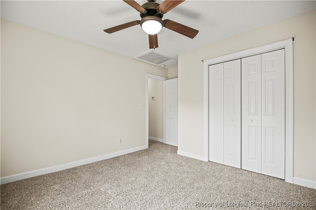 106 Linden Road Cameron, NC 28326 - Photo 28 of 48 a view of an empty room and chandelier fan