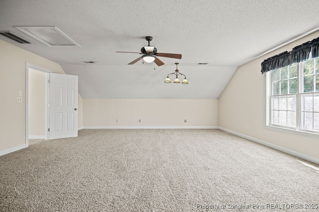 106 Linden Road Cameron, NC 28326 - Photo 32 of 48 a view of a livingroom with a ceiling fan and window