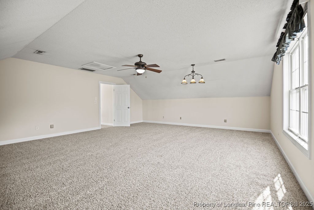 106 Linden Road Cameron, NC 28326 - Photo 33 of 48 a view of a livingroom with a ceiling fan and window