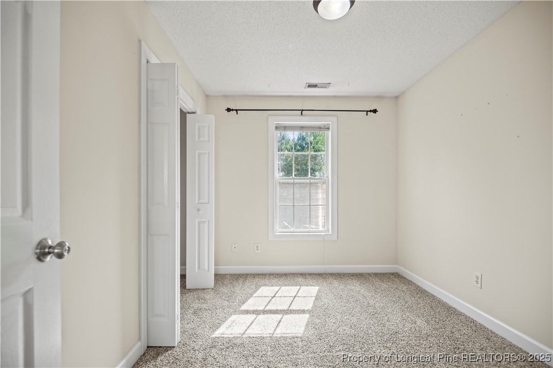 106 Linden Road Cameron, NC 28326 - Photo 35 of 48 an empty room with windows