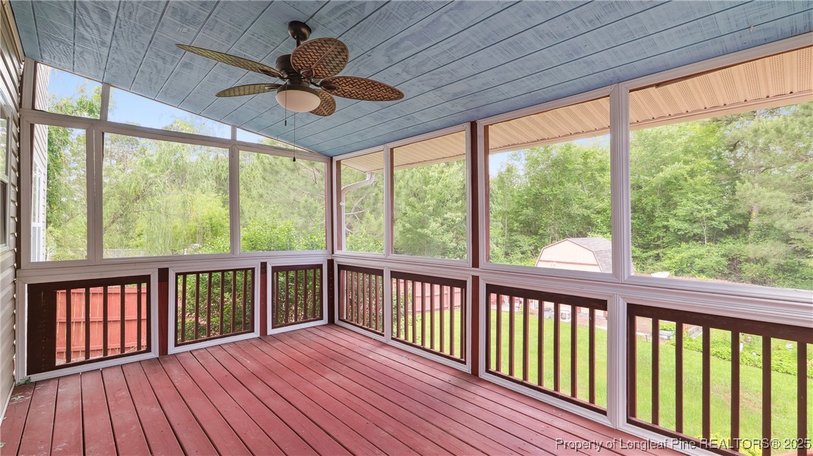 106 Linden Road Cameron, NC 28326 - Photo 38 of 48 a view of empty room with wooden floor and iron stairs